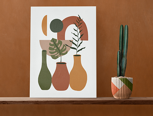 canvas-wall-art-on-a-wooden-shelf-with-cactus-6K6FGXG